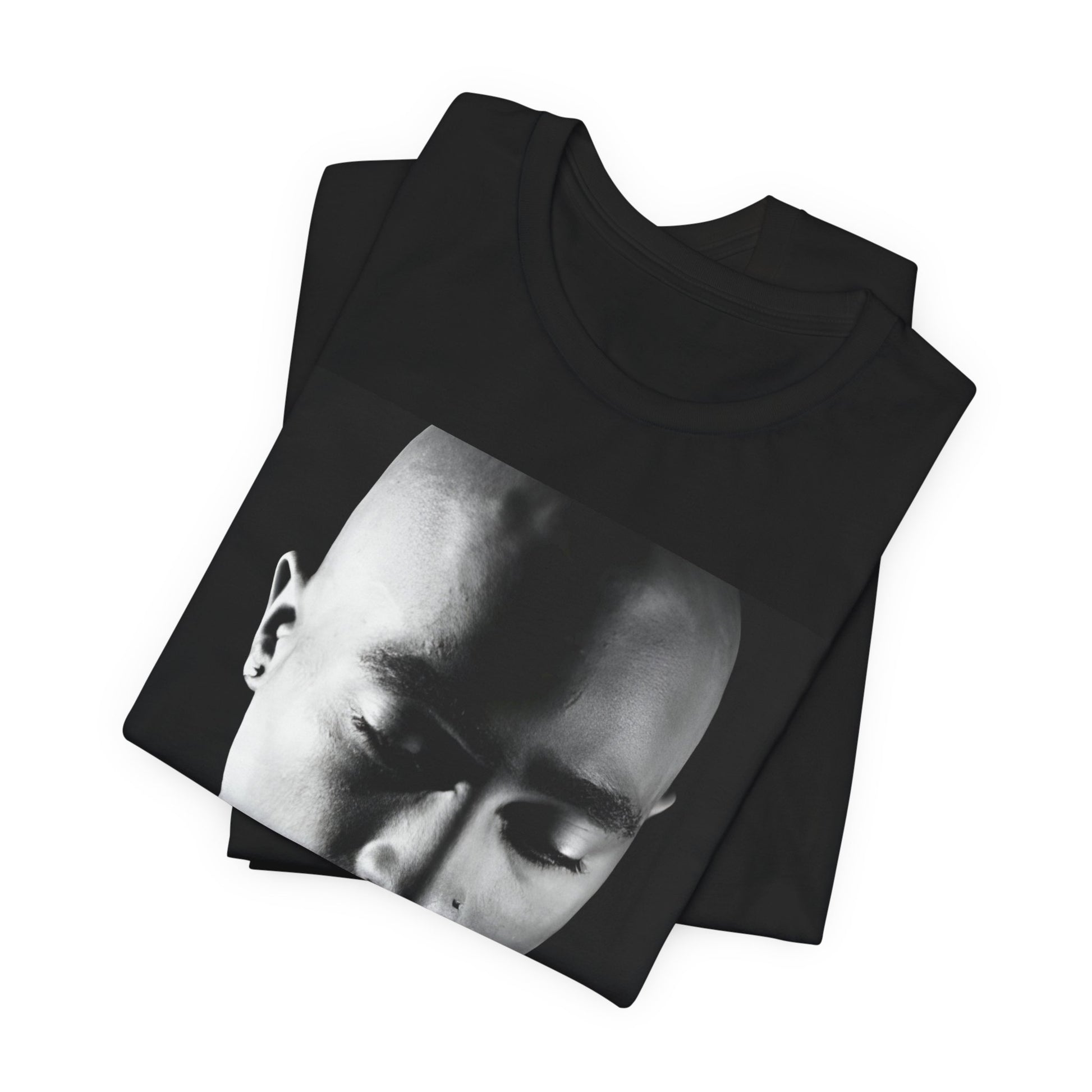 A black graphic t-shirt featuring a black and white streetwear rebel graphic of Tupac.