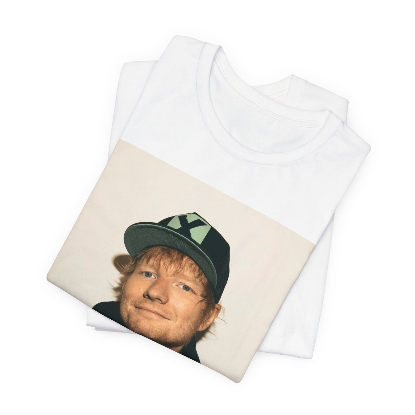 A black graphic t-shirt featuring a glamorous graphic of Ed Sheeran as a global tour icon.