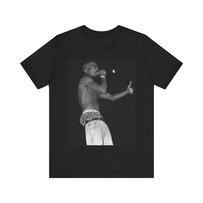A black graphic t-shirt featuring a graphic of Tupac as a justice fighter.