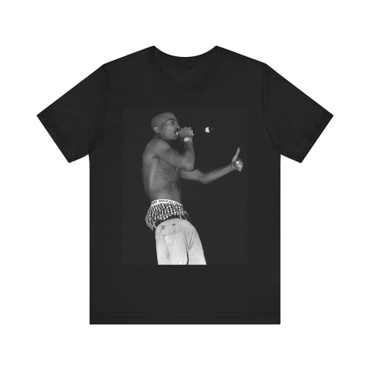 A black graphic t-shirt featuring a graphic of Tupac as a justice fighter.