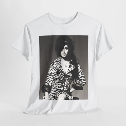 A black graphic t-shirt featuring a vintage black and white portrait of Amy Winehouse, showing her with her signature beehive and soulful expression.