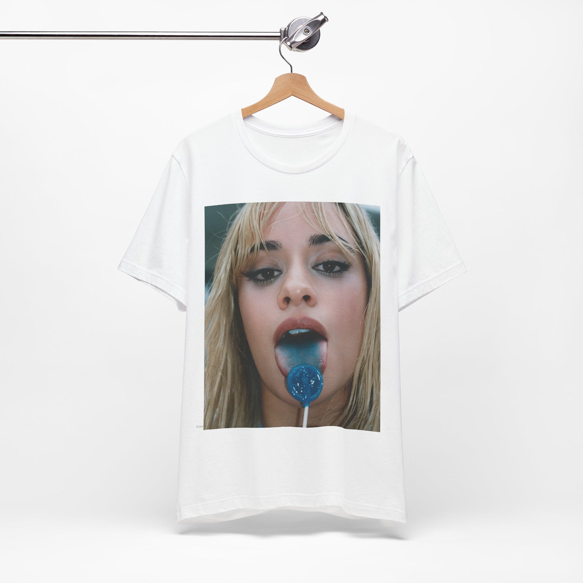 A black graphic t-shirt featuring a graphic related to Camila Cabello's C,XOXO album, with an aesthetic design.