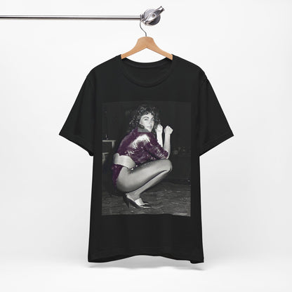 A black graphic t-shirt featuring a graphic of Laura Branigan as an 80s disco pop queen.