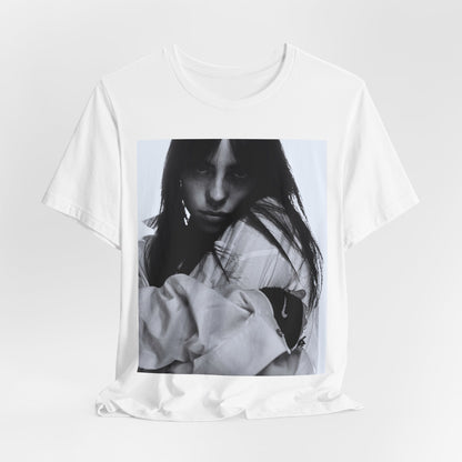 Billie Eilish posing in her signature oversized designer streetwear, printed on a graphic t-shirt.