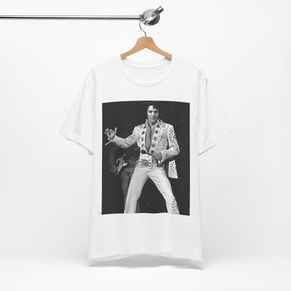 A black graphic t-shirt featuring a stylized graphic of Elvis Presley as The King of Rock 'n' Roll.