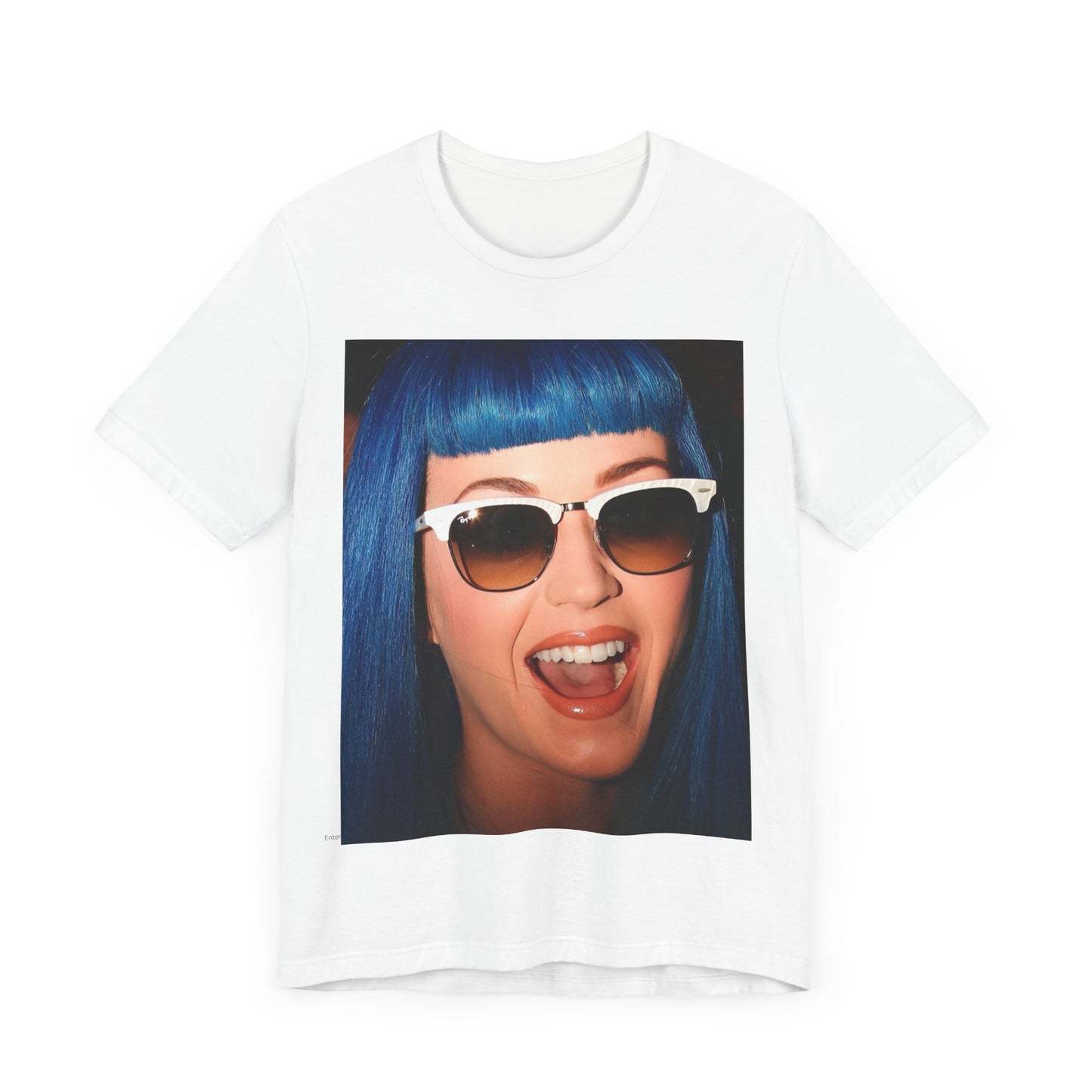 A black graphic t-shirt featuring a retro graphic of Katy Perry with blue hair.