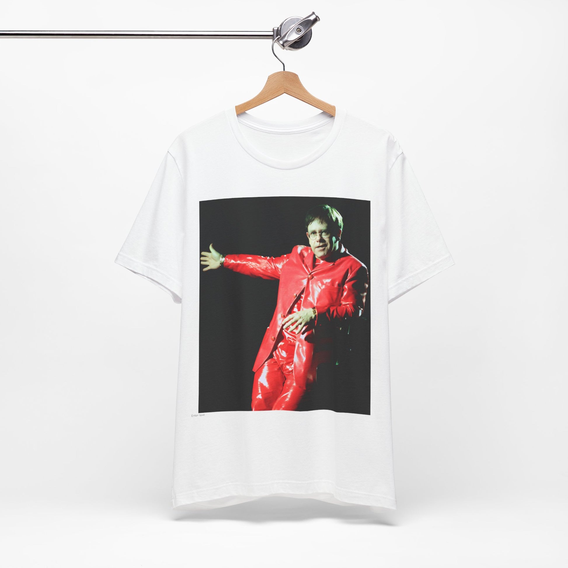 A black graphic t-shirt featuring a vintage photo portrait of Elton John as a music legend.