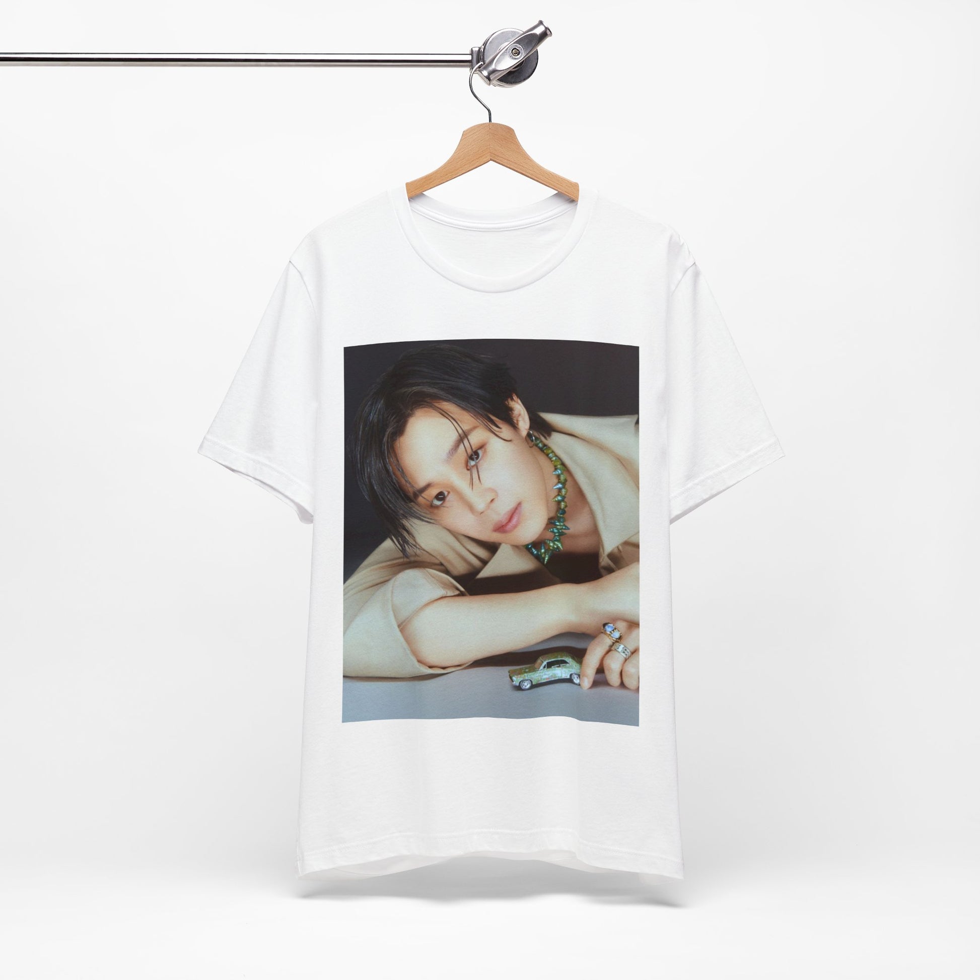 A black graphic t-shirt featuring a retro graphic related to Jimin's 'Filter' era.