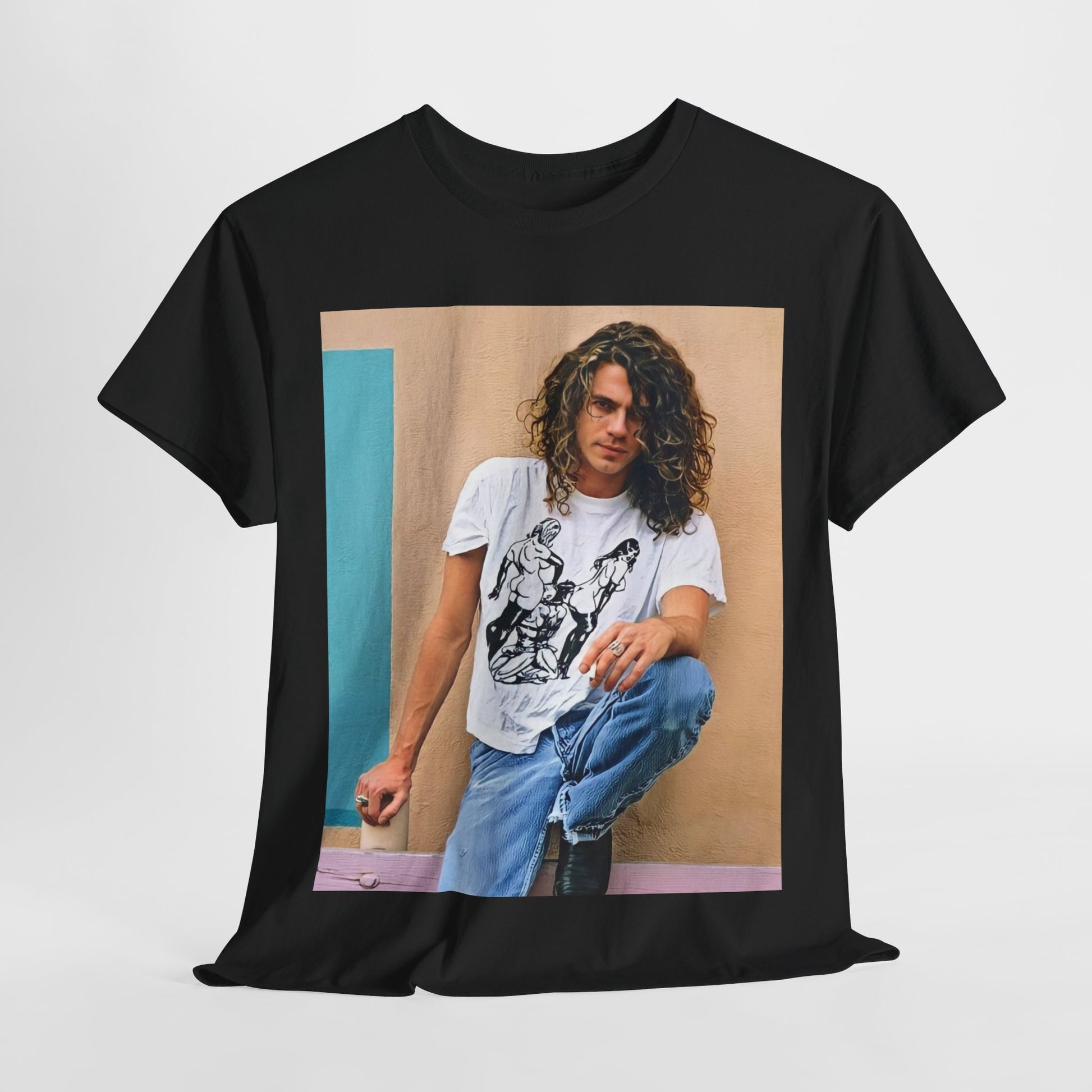A black graphic t-shirt featuring a 90s chill retro rock graphic of INXS.