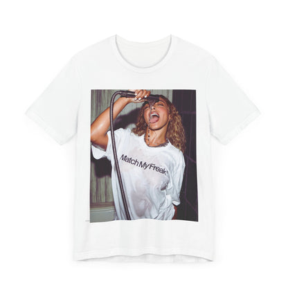 A black graphic t-shirt featuring an aesthetic graphic of Tinashe with a 'Nasty' vibe.