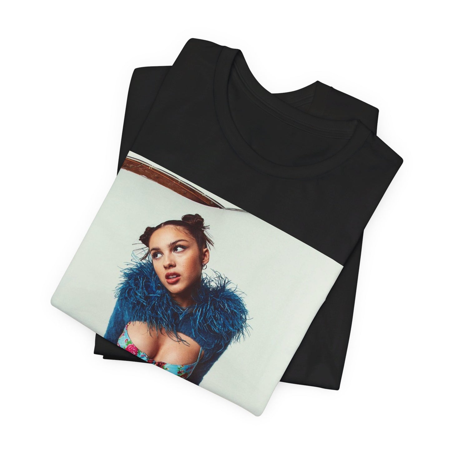 A black graphic t-shirt featuring a graphic of Olivia Rodrigo with 'teen angst vibes'.