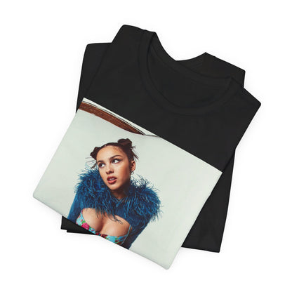 A black graphic t-shirt featuring a graphic of Olivia Rodrigo with 'teen angst vibes'.