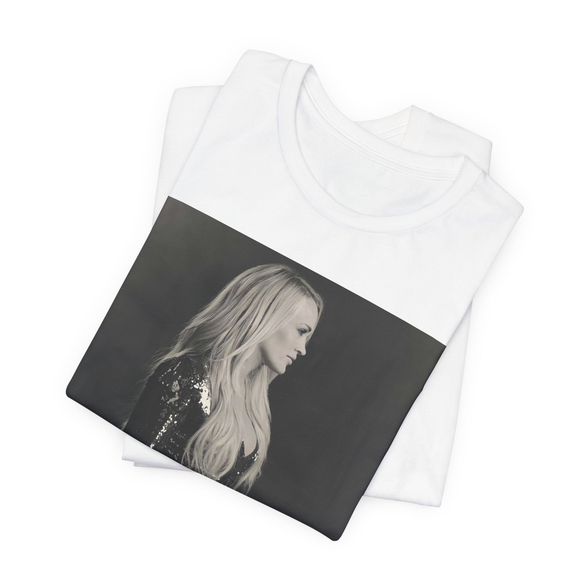 A black graphic t-shirt featuring a black and white photo of Carrie Underwood performing live on stage.