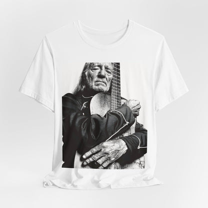 A black graphic t-shirt featuring a vintage country legend graphic of Willie Nelson.