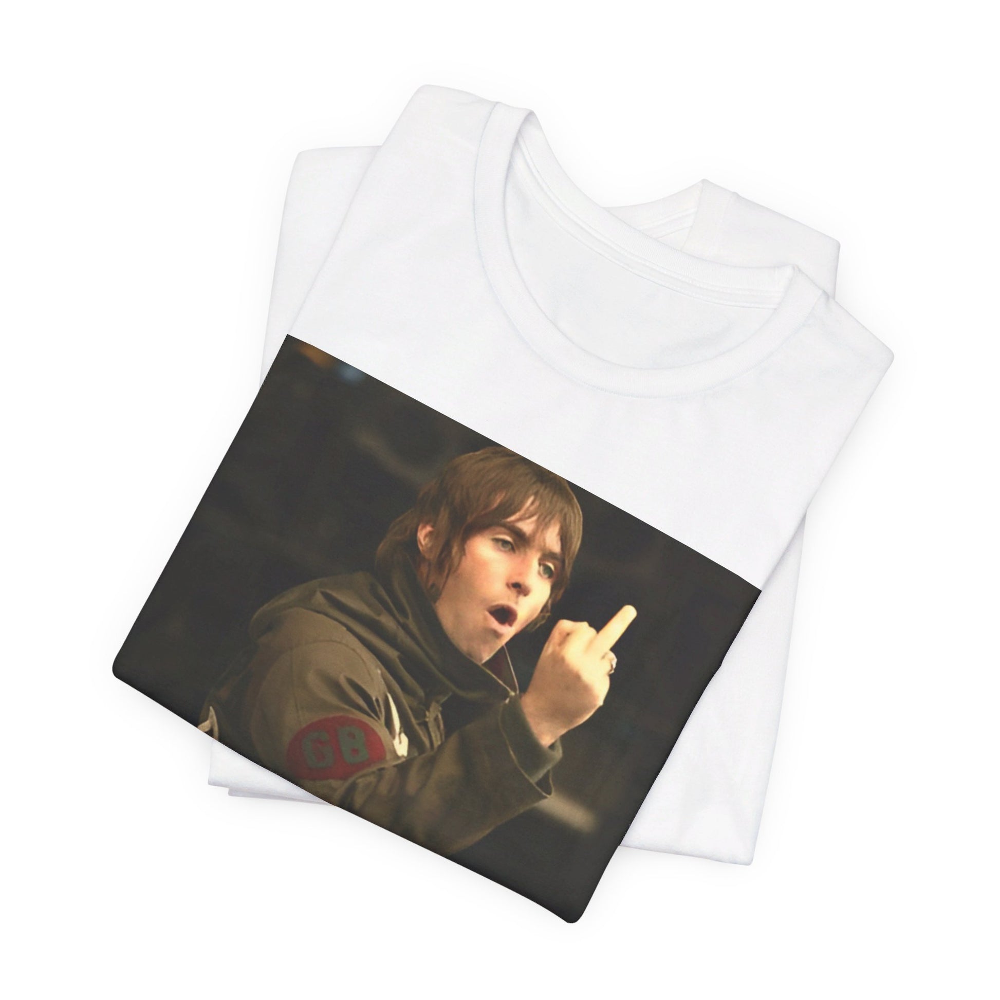 A black graphic t-shirt featuring a graphic of Liam Gallagher from Oasis giving the middle finger during a concert.