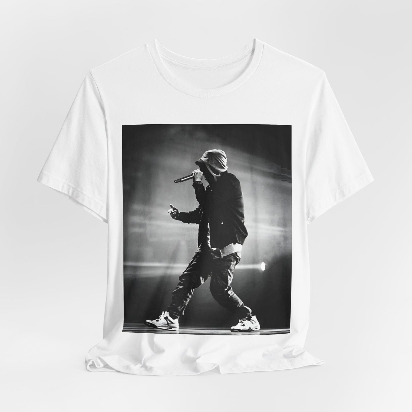 A black graphic t-shirt featuring a boxy hip hop aesthetic graphic of Eminem.