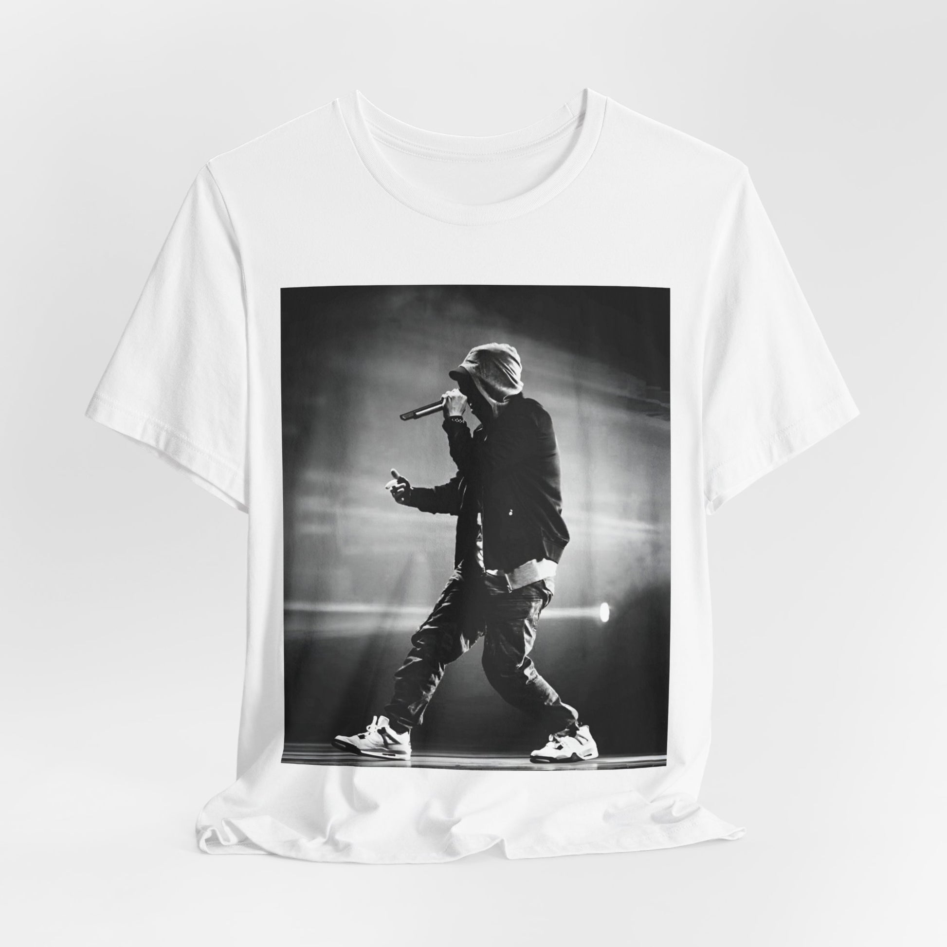 A black graphic t-shirt featuring a boxy hip hop aesthetic graphic of Eminem.