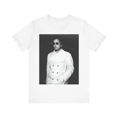 A black graphic t-shirt featuring a vintage black and white photo of Bob Dylan in a contemplative or iconic pose.