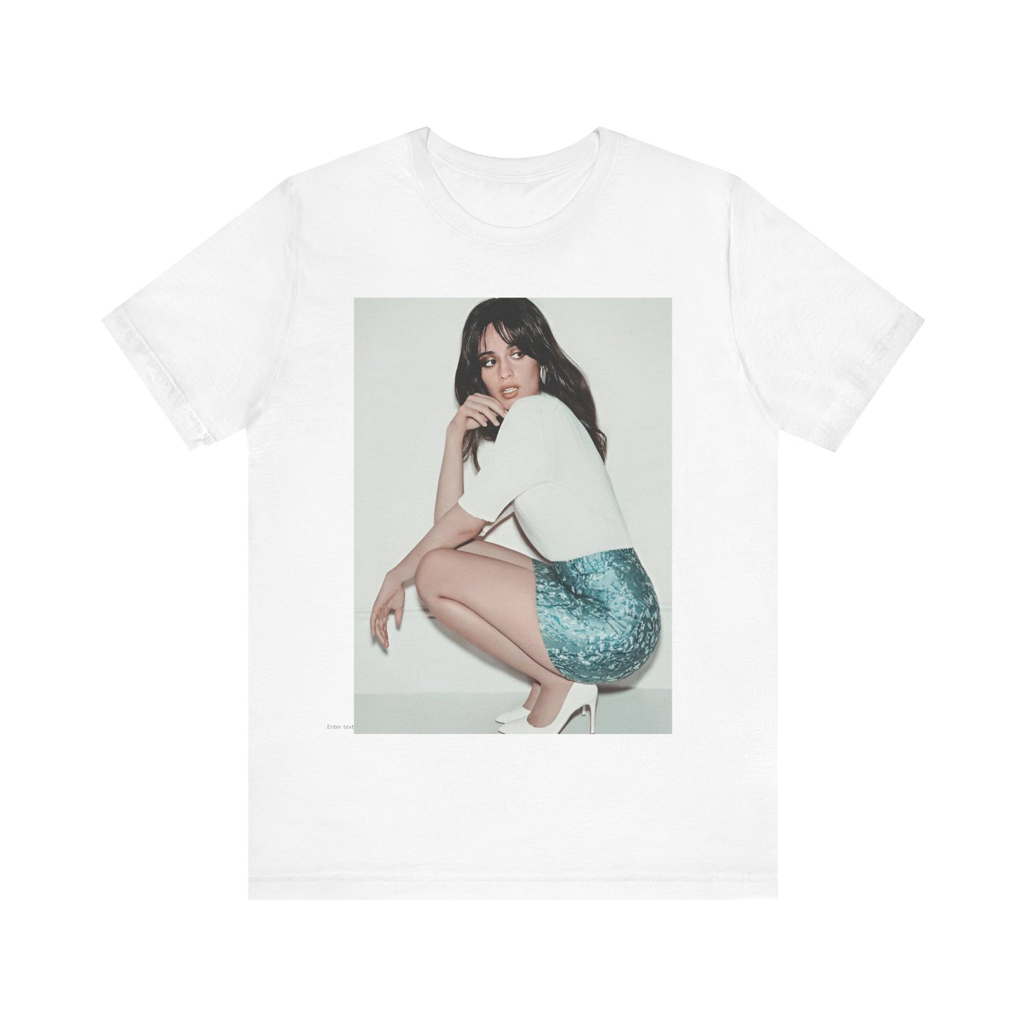 A black graphic t-shirt featuring a stylized graphic of Camila Cabello as a Latin pop princess.