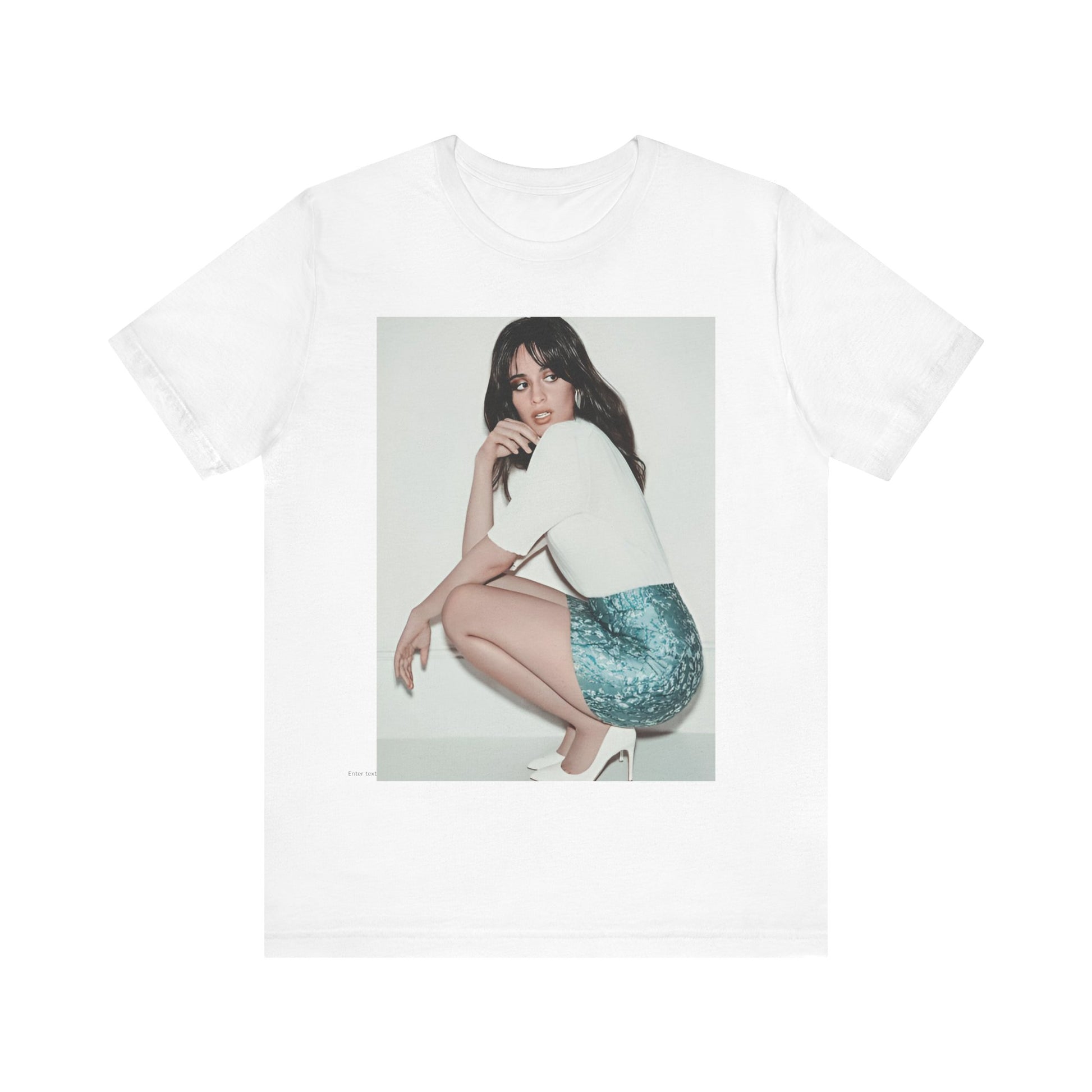 A black graphic t-shirt featuring a stylized graphic of Camila Cabello as a Latin pop princess.
