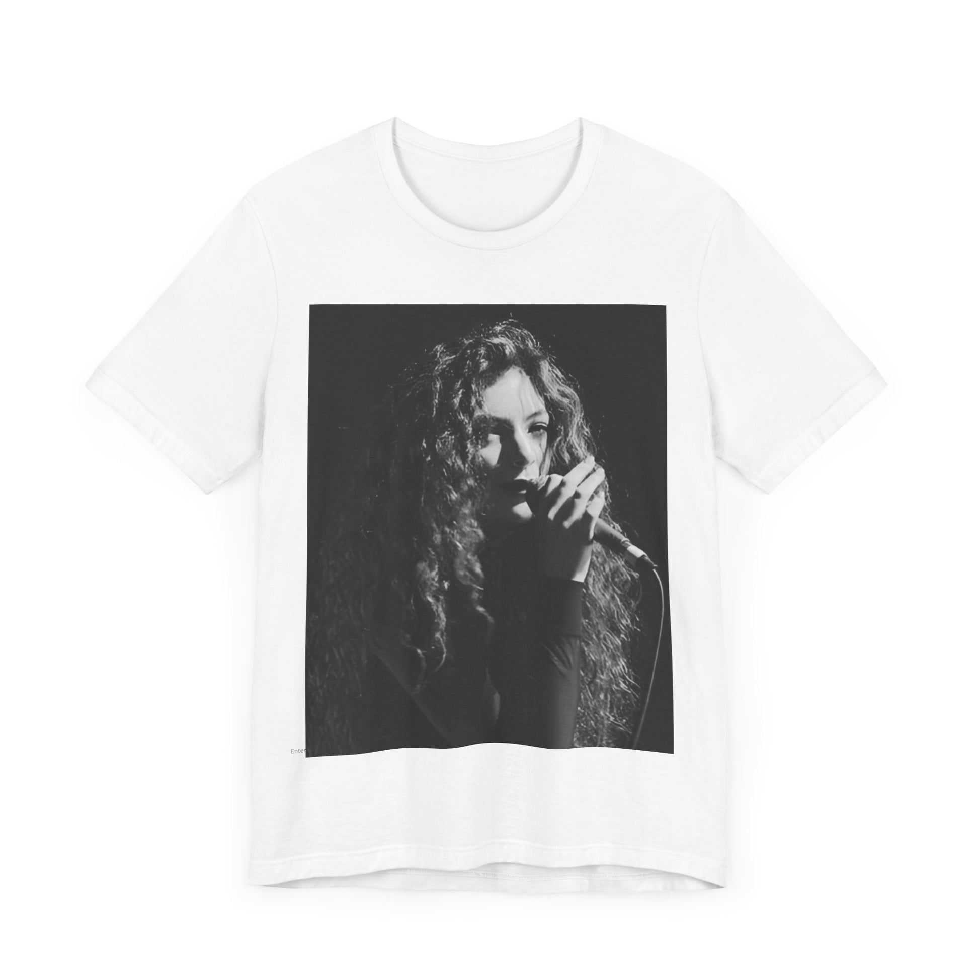 A black graphic t-shirt featuring a graphic or photo of Lorde performing live.