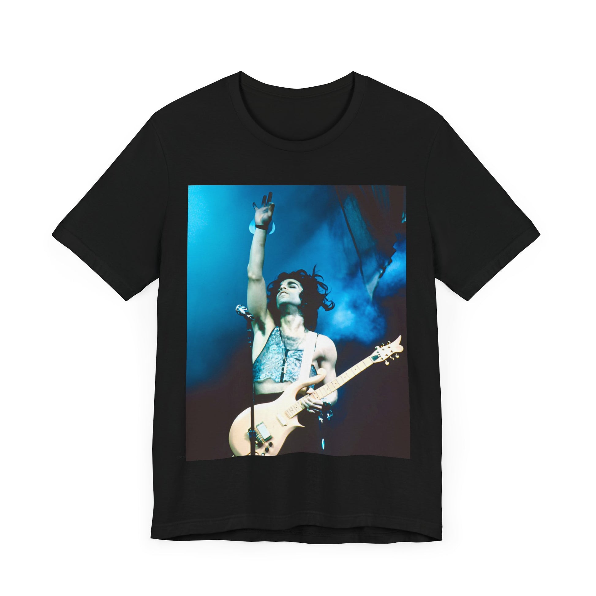 A black graphic t-shirt featuring a graphic of Prince as a guitar god and virtuoso performer.