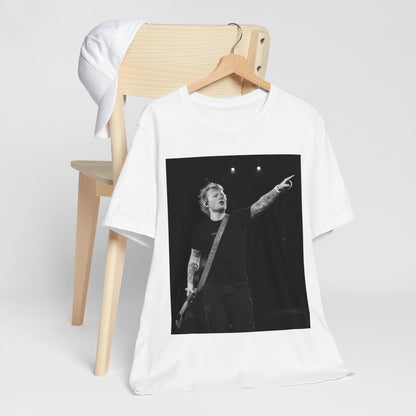 A black graphic t-shirt featuring a black and white graphic or photo of Ed Sheeran performing live on stage.