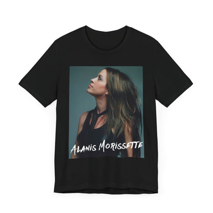 A black graphic t-shirt featuring a retro-style graphic of Alanis Morissette, possibly with her signature or a unique artistic interpretation.