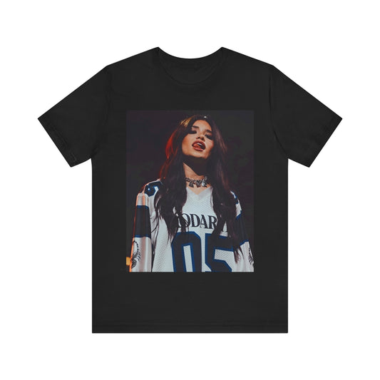 A black graphic t-shirt featuring a graphic or photo of Nessa Barrett performing live.