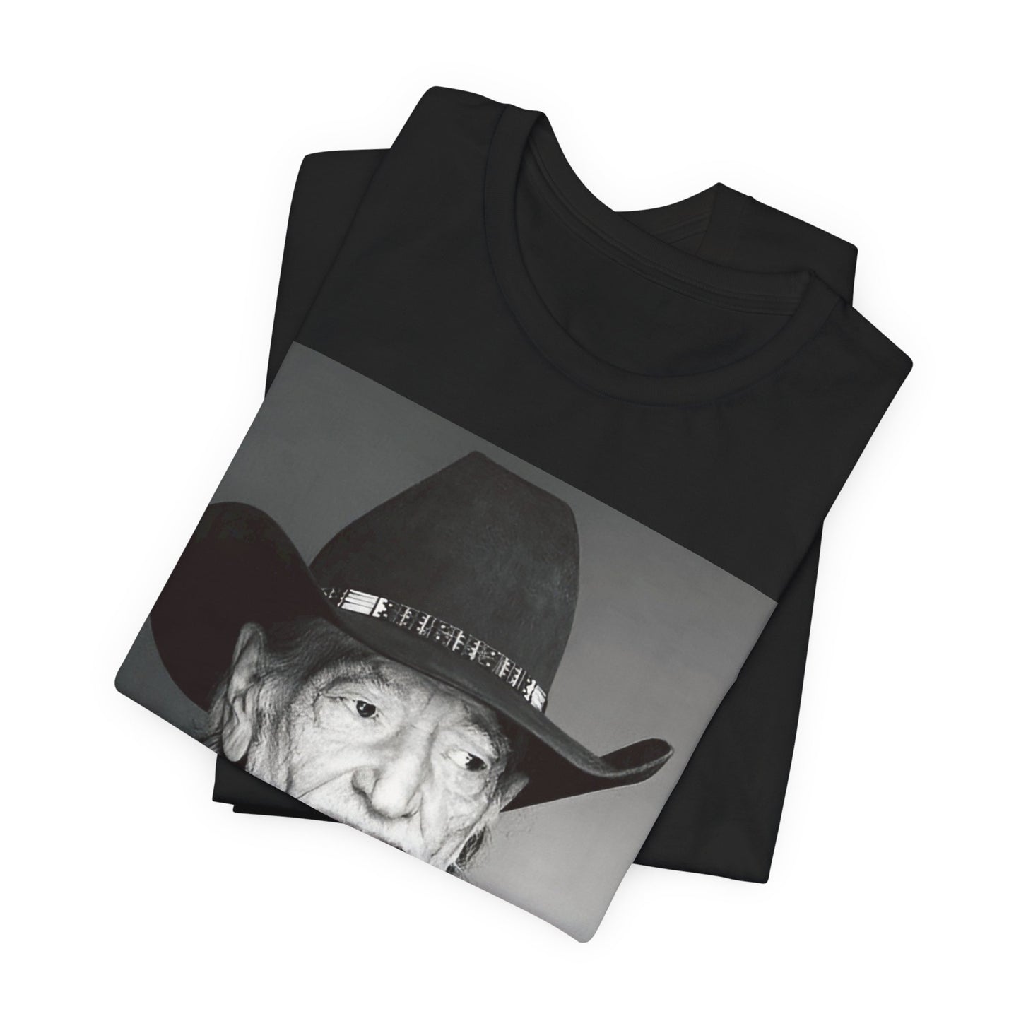 A black graphic t-shirt featuring a graphic of Willie Nelson with his iconic guitar 'Trigger'.