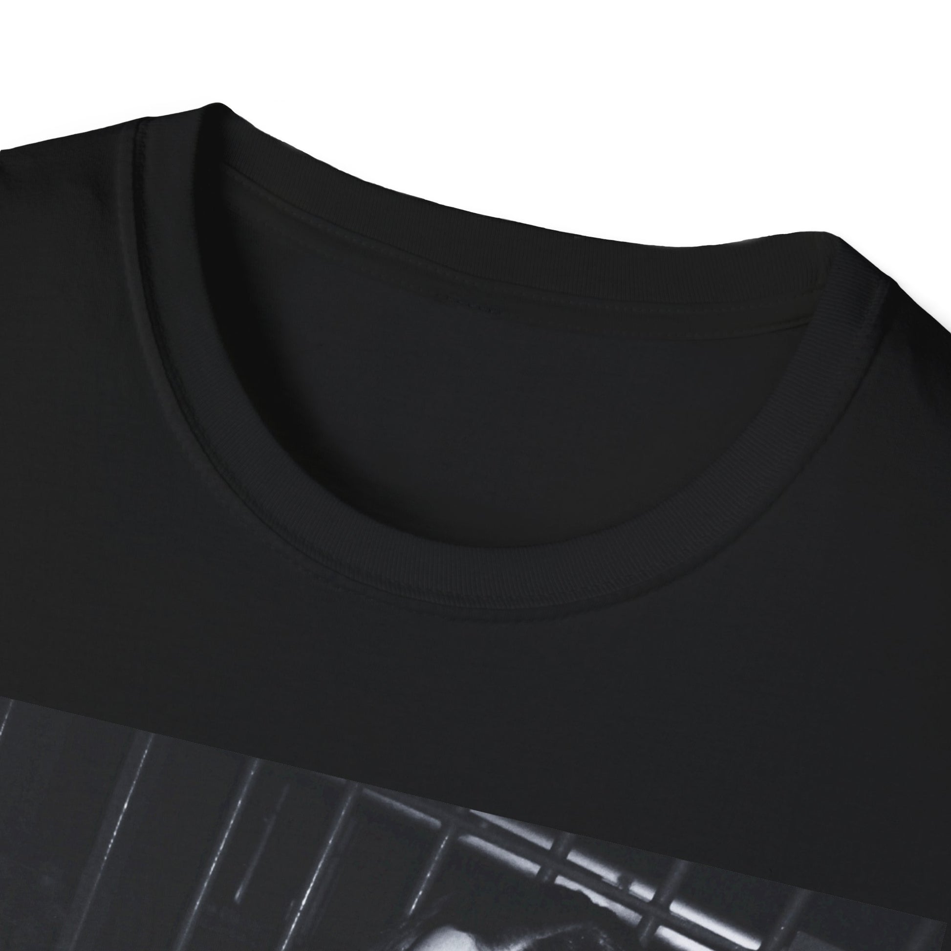 A black graphic t-shirt featuring a graphic related to Charli XCX's 'Brat' album.