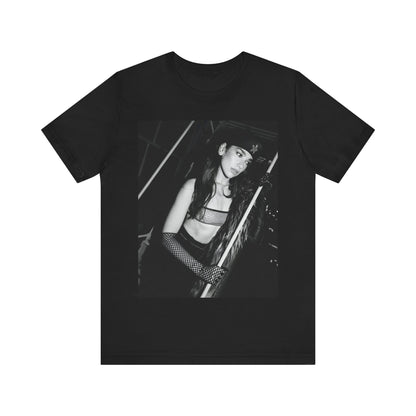 A black graphic t-shirt featuring a black and white, monochrome graphic or portrait of Dua Lipa.