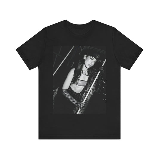 A black graphic t-shirt featuring a black and white, monochrome graphic or portrait of Dua Lipa.