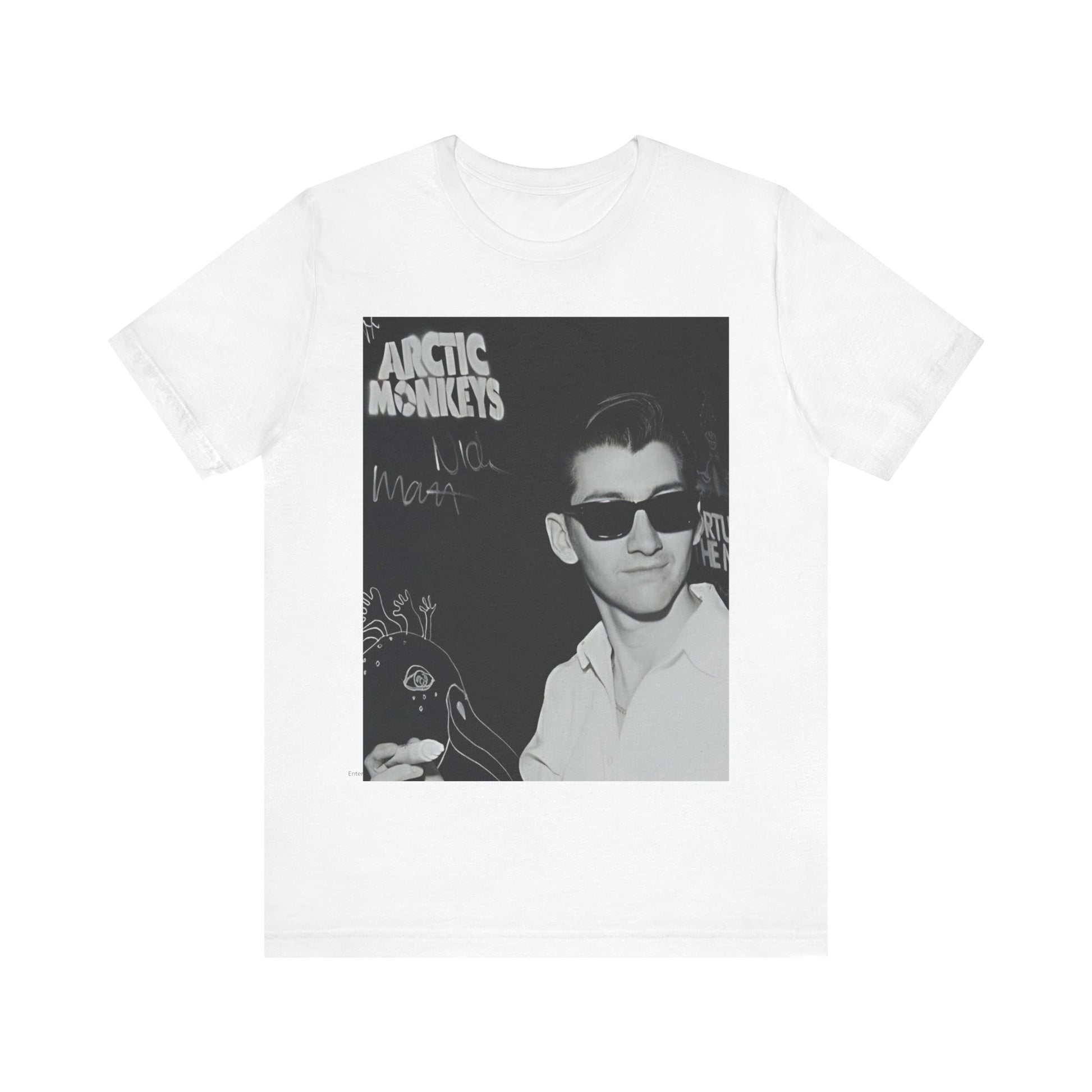 A black graphic t-shirt featuring a black and white portrait photo of Alex Turner from Arctic Monkeys, showing his signature look.