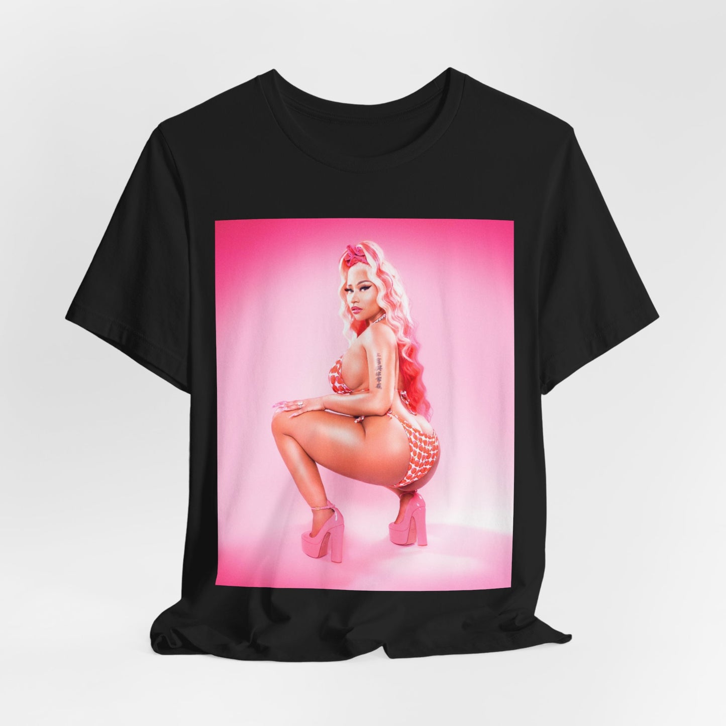 A black graphic t-shirt featuring a graphic related to Nicki Minaj's 'Anaconda' song or era.