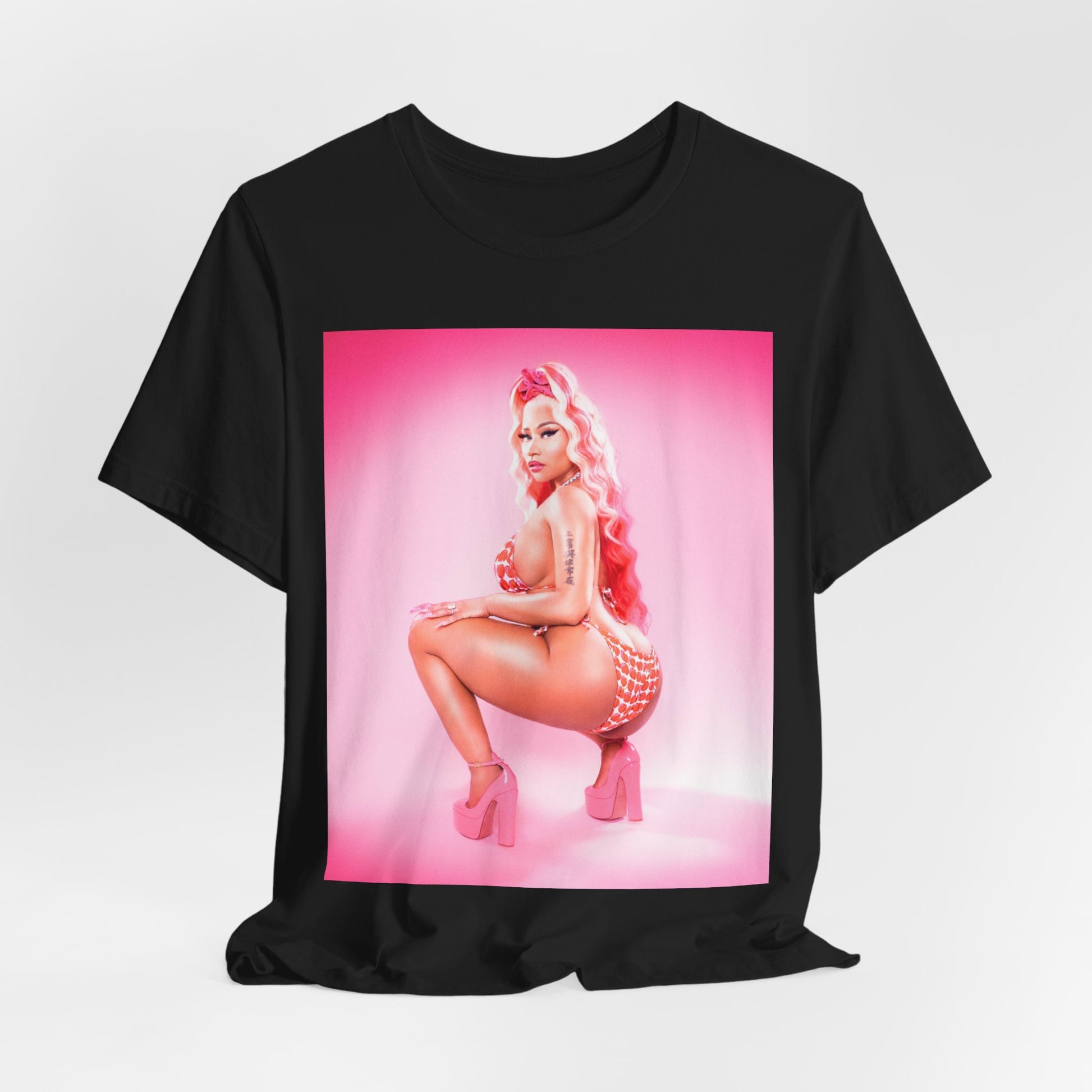 A black graphic t-shirt featuring a graphic related to Nicki Minaj's 'Anaconda' song or era.