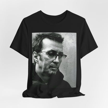 A black graphic t-shirt featuring a black and white, monochrome graphic or photo of Eric Clapton.