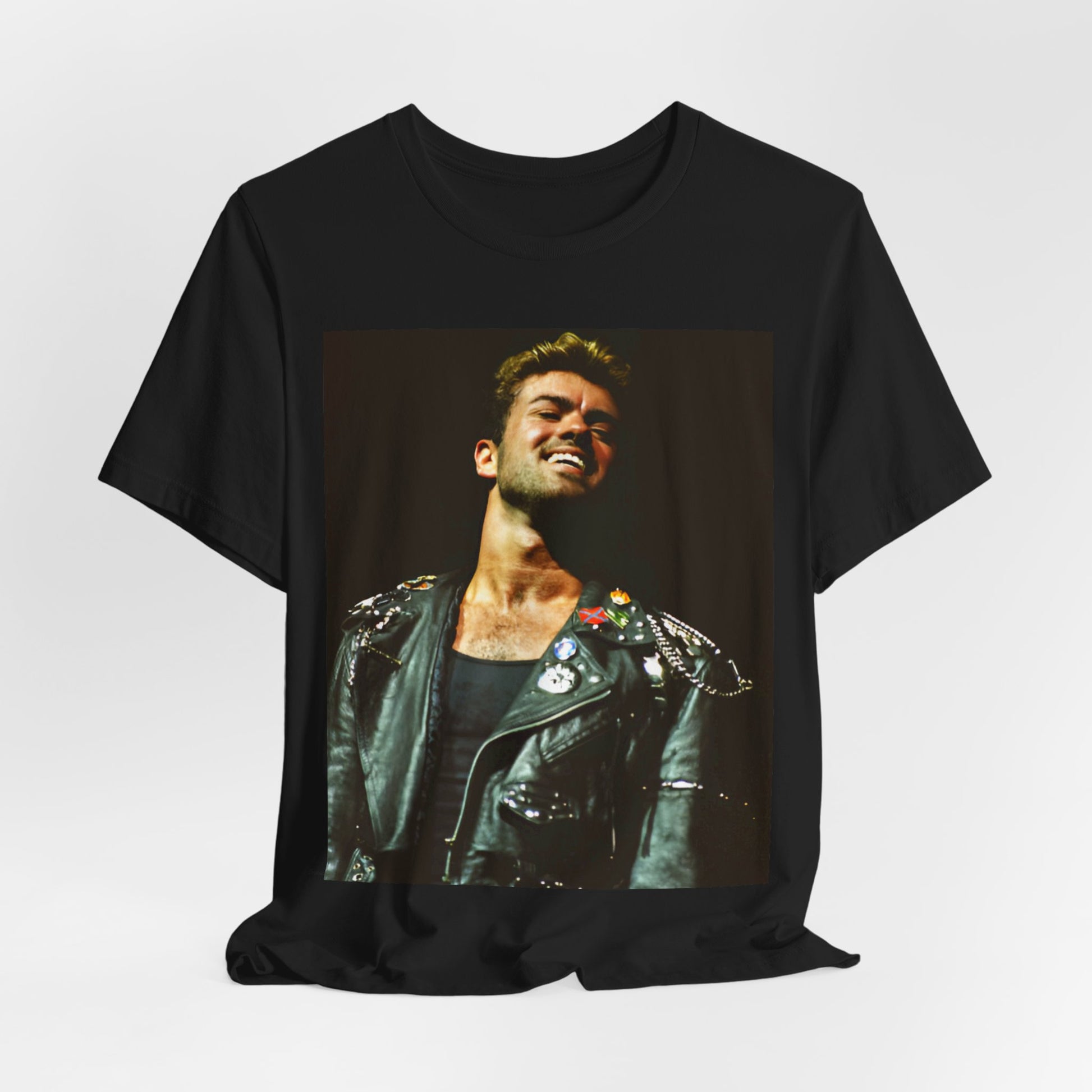 A black graphic t-shirt featuring a graphic related to George Michael's 'Careless Whisper' song or era.