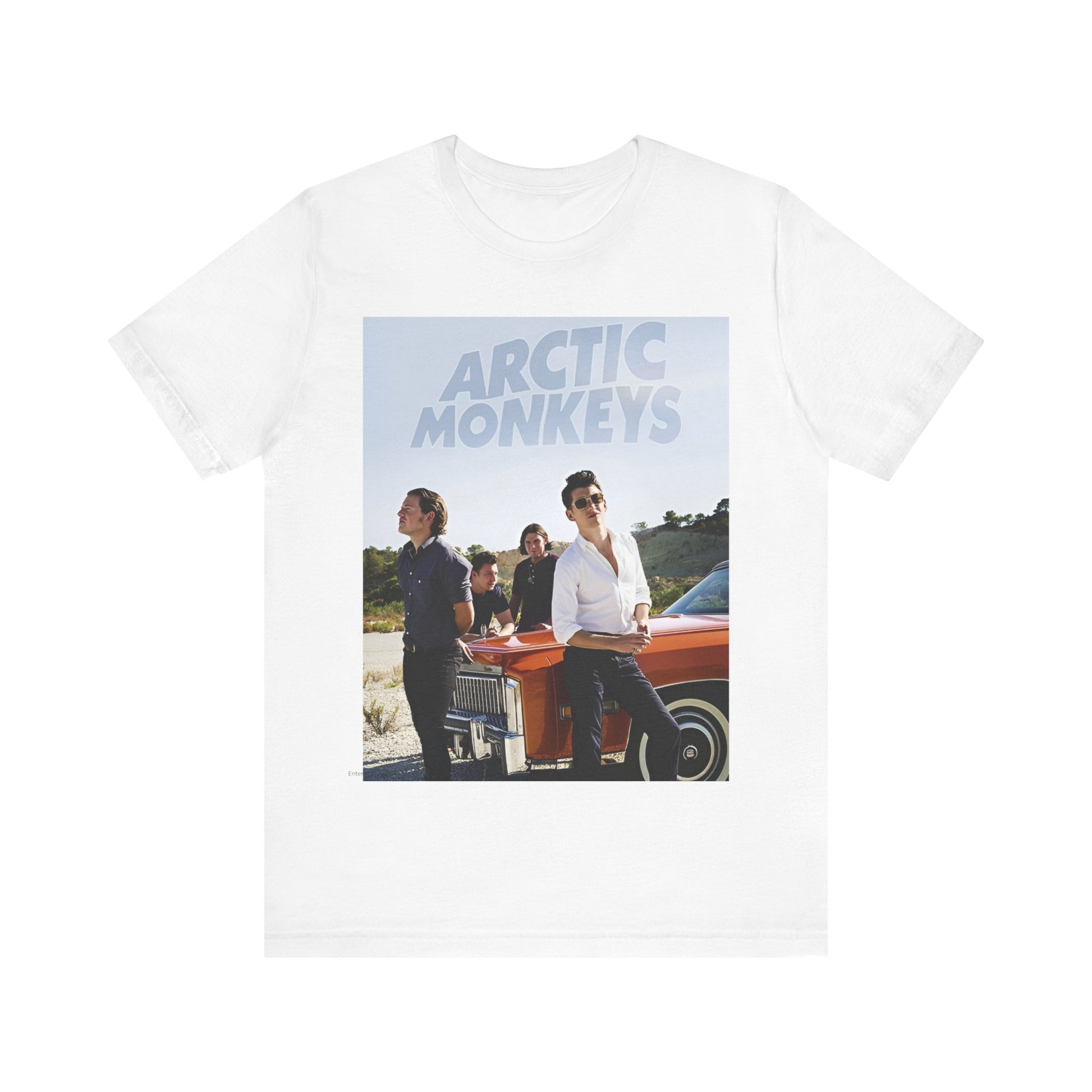 A black graphic t-shirt featuring a design related to Arctic Monkeys' 'AM' album era, possibly with the album art or band imagery.