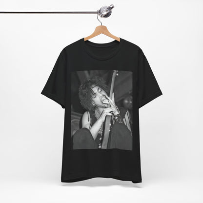 A black graphic t-shirt featuring a graphic or photo of Prince performing wildly on stage.