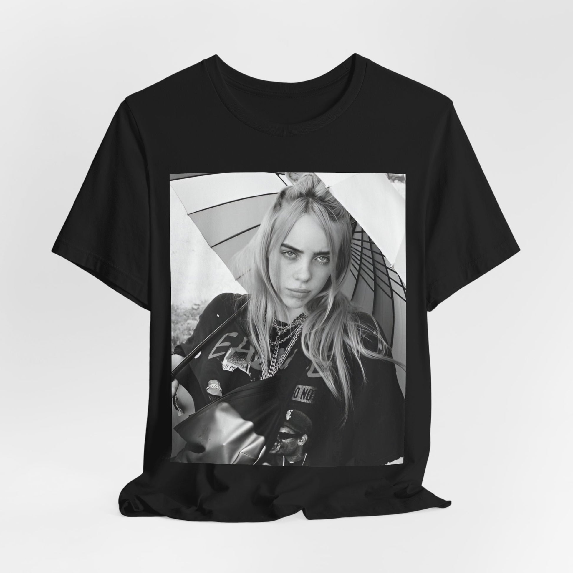 A graphic t-shirt inspired by the colorful and iconic music video for "Bad Guy" by Billie Eilish.