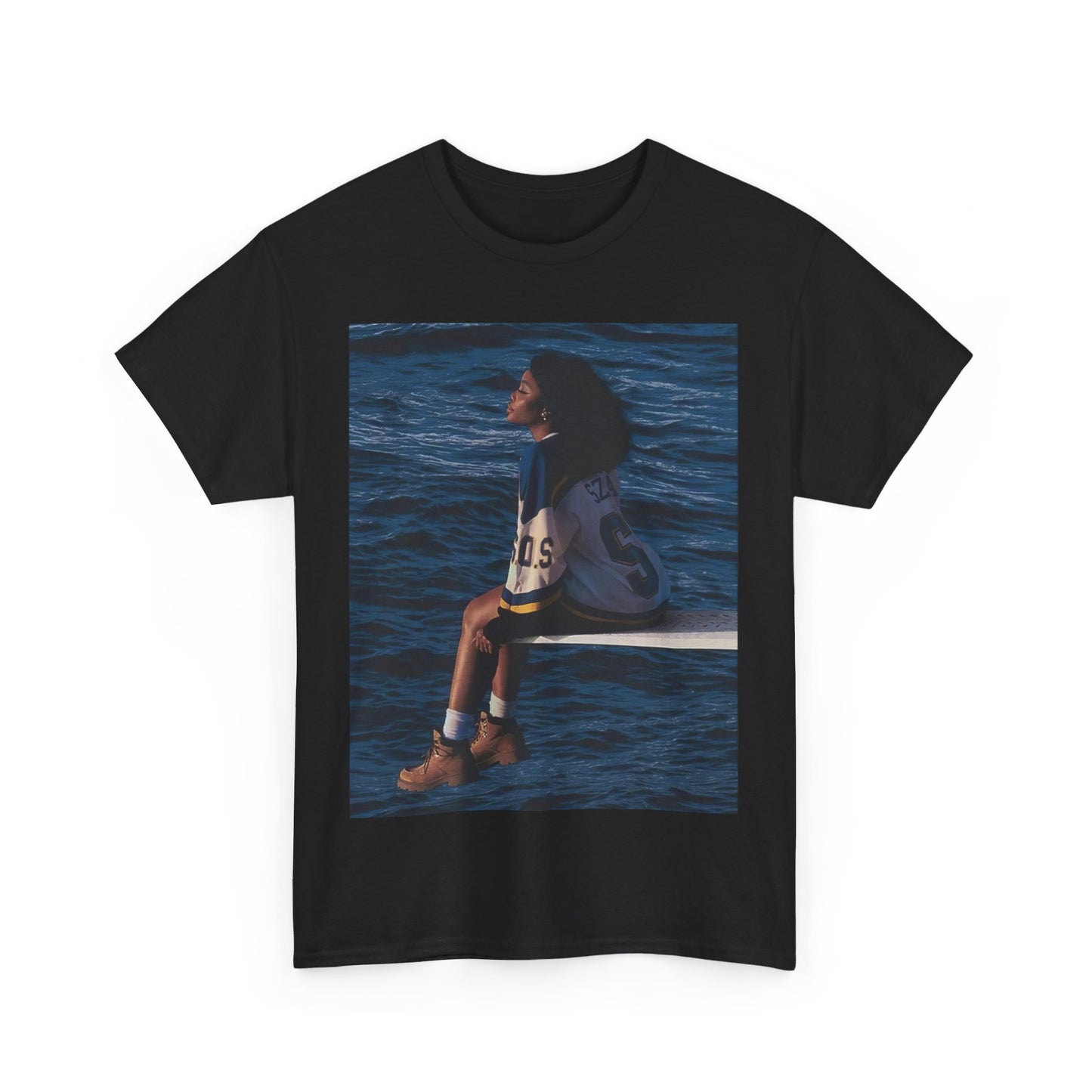 A black graphic t-shirt featuring a graphic related to SZA's 'SOS' album.