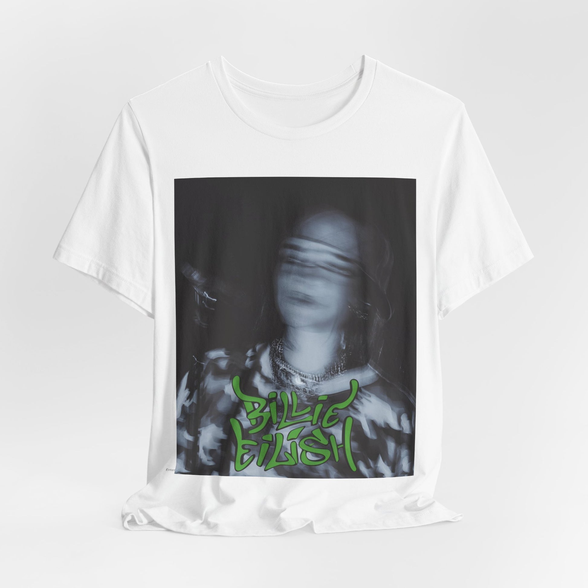 A photo of Billie Eilish in a classic 'anti-popstar' pose, with a bored expression and slouchy streetwear, printed on a graphic t-shirt.