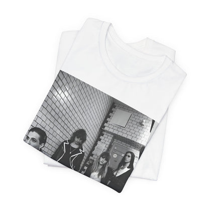 A black graphic t-shirt featuring a black and white graphic or photo of Maneskin in a backstage setting.
