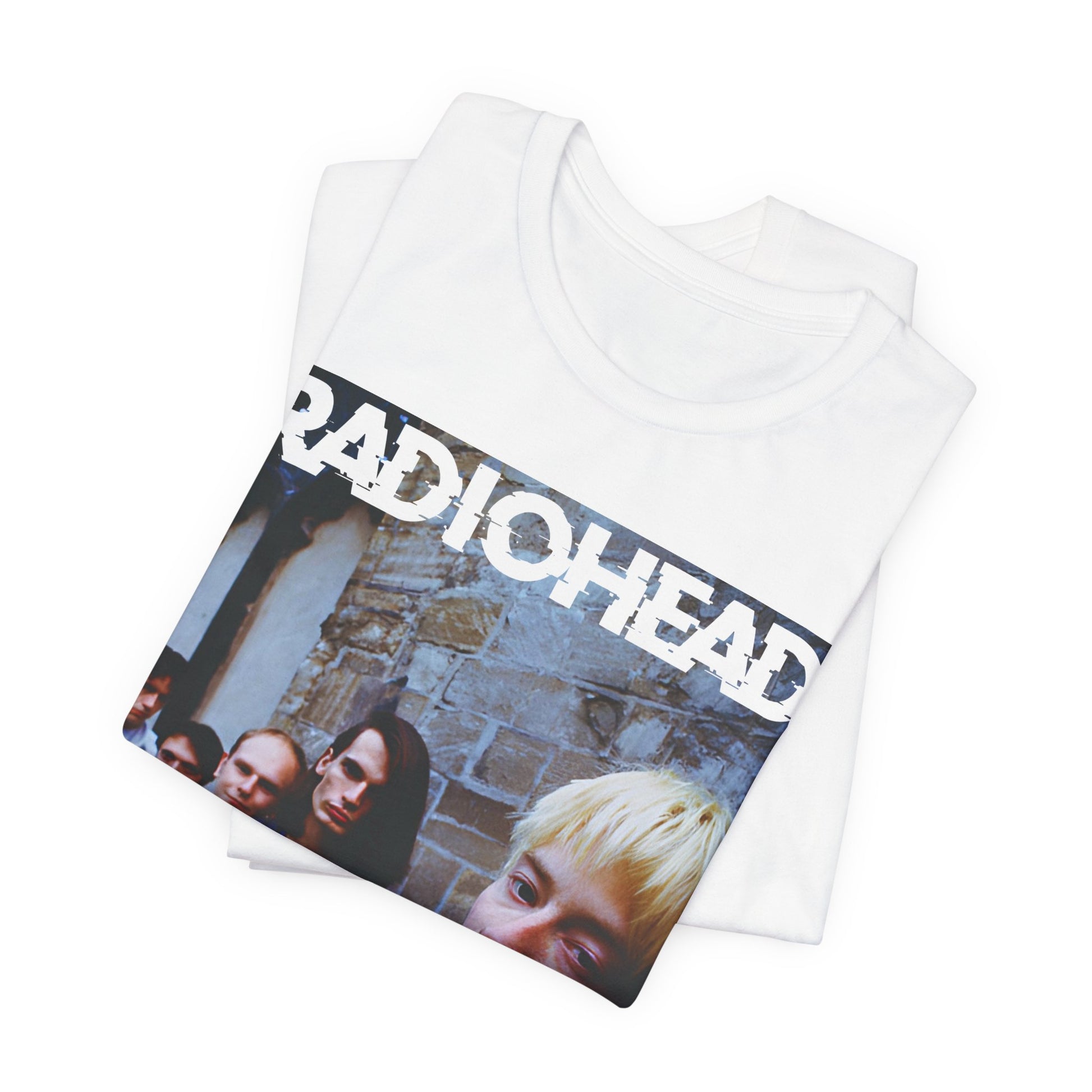 A black graphic t-shirt featuring a 90s graphic related to Radiohead's 'Karma Police' song or era.