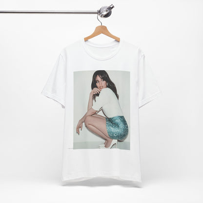 A black graphic t-shirt featuring a stylized graphic of Camila Cabello as a Latin pop princess.