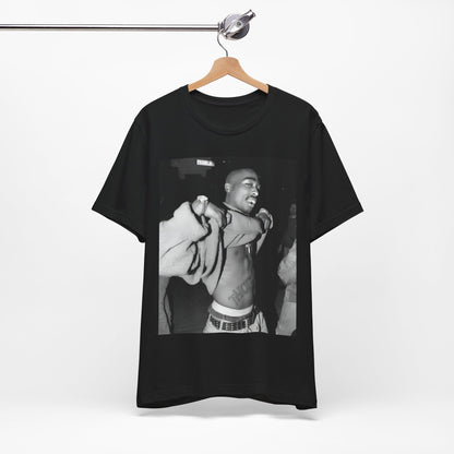 A black graphic t-shirt featuring a vintage hip hop icon graphic of Tupac.