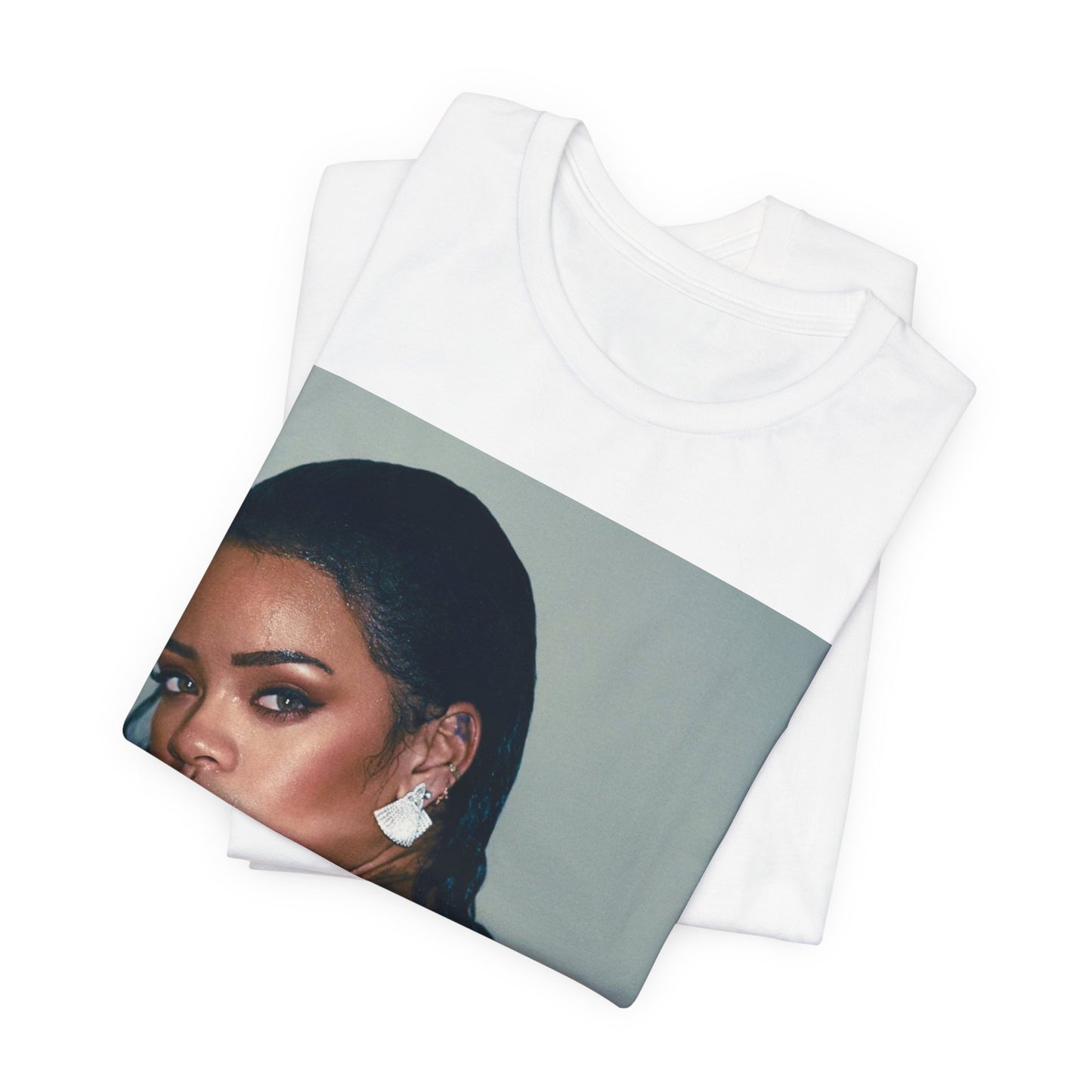 A black graphic t-shirt featuring a vintage pop icon graphic of Rihanna.