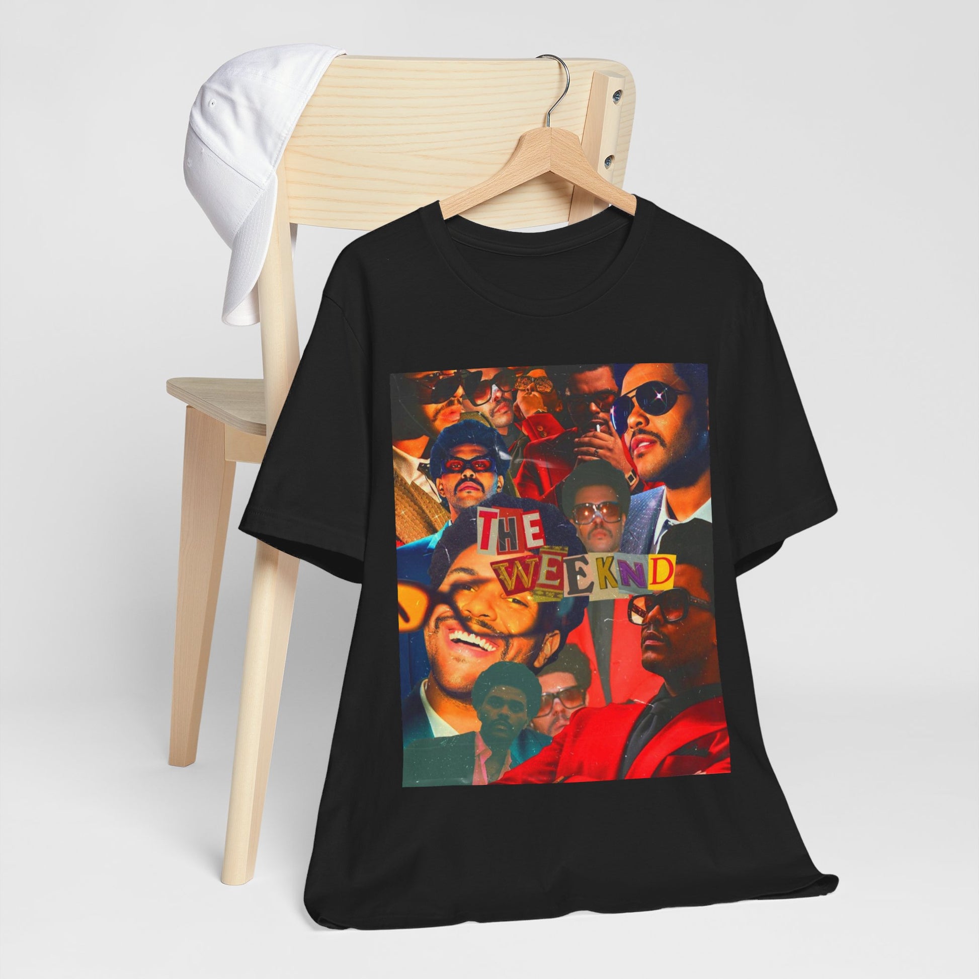 A black graphic t-shirt featuring a collage graphic of The Weeknd.