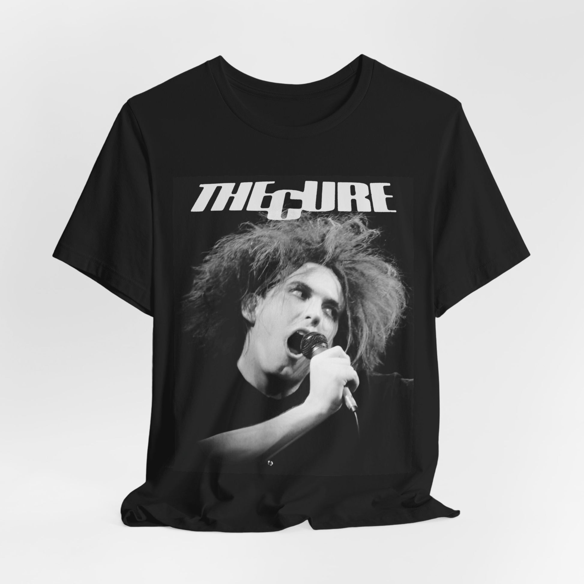 A black graphic t-shirt featuring a graphic of The Cure with a dark romanticism core aesthetic.